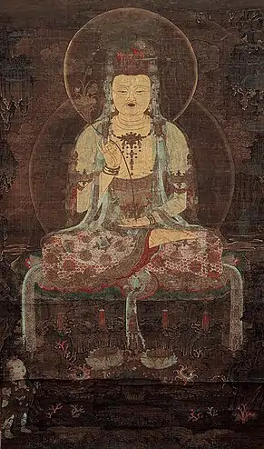 À esquerda, pintura da Dinastia Goryeo de Avalokiteshvara da Lua-d'Água, segurando um ramo de salgueiro. Na China, sob o nome de Guan Yin, ele foi femininizado. O símbolo do véu de luar e reflexo nas águas como emanação da Compaixão, atributo de Avalokiteshvara, aparece em versos do Avatamsaka Sutra:"Com uma grande rede de luz, removo o sofrimento dos seres sencientes causado pela febre das miríades de paixões.""Assim como a lua no céuSupera as estrelas e parece crescer e minguar,Mostra seu reflexo em todas as águas,E aparece face a face com aqueles que a contemplam,Assim também a lua clara de BudaOfusca outros veículos, mostrando extensão e brevidade,Aparecendo na clara mente-água de humanos e deusesE parecendo estar presente a todos""O bodisatva é como o sol e a lua brilhantes.Um espelho branco brilhante aparece suspenso no céu.A sombra da lua reflete em inúmeros rios,Mas a entidade nos céus não se mistura com a água.Assim são os ensinamentos puros do bodisatva.Ele aparece na água das mentes de todos os seres,Mas não se mistura com o mundo"