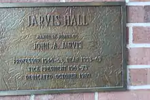 This is a picture of the plaque dedicated to John A. Jarvis. He was a professor, dean, and vice president of UW-Stout. The plaque is located in Jarvis Hall in Menomonie, WI.