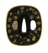 tsuba with autumn flowers.