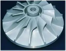 A grey plastic turbine